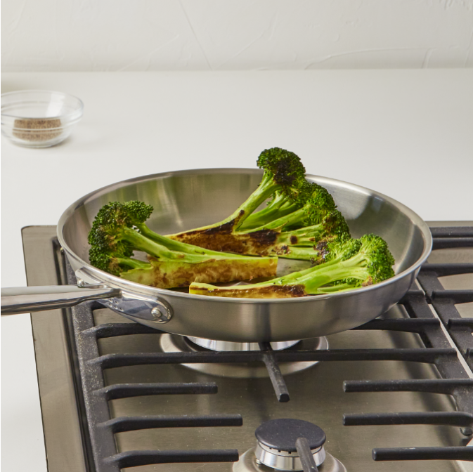 Charring broccoli in a Misen Stainless Steel Skillet