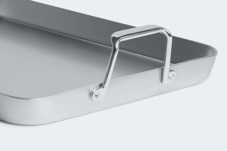 The walls of the Misen Roasting Pan are the perfect height to still let airflow in, and keep liquids from spilling.
