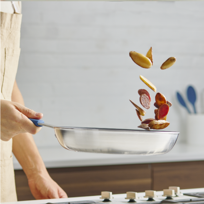 Flipping potatoes in a Misen Stainless Steel Skillet