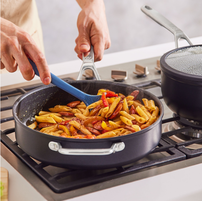 Stirring jambalaya pasta in a Misen Nonstick Sauté