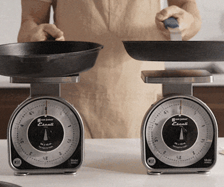 Weighing a Misen Pre-Seasoned Carbon Steel pan side by side a Cast Iron Pan.