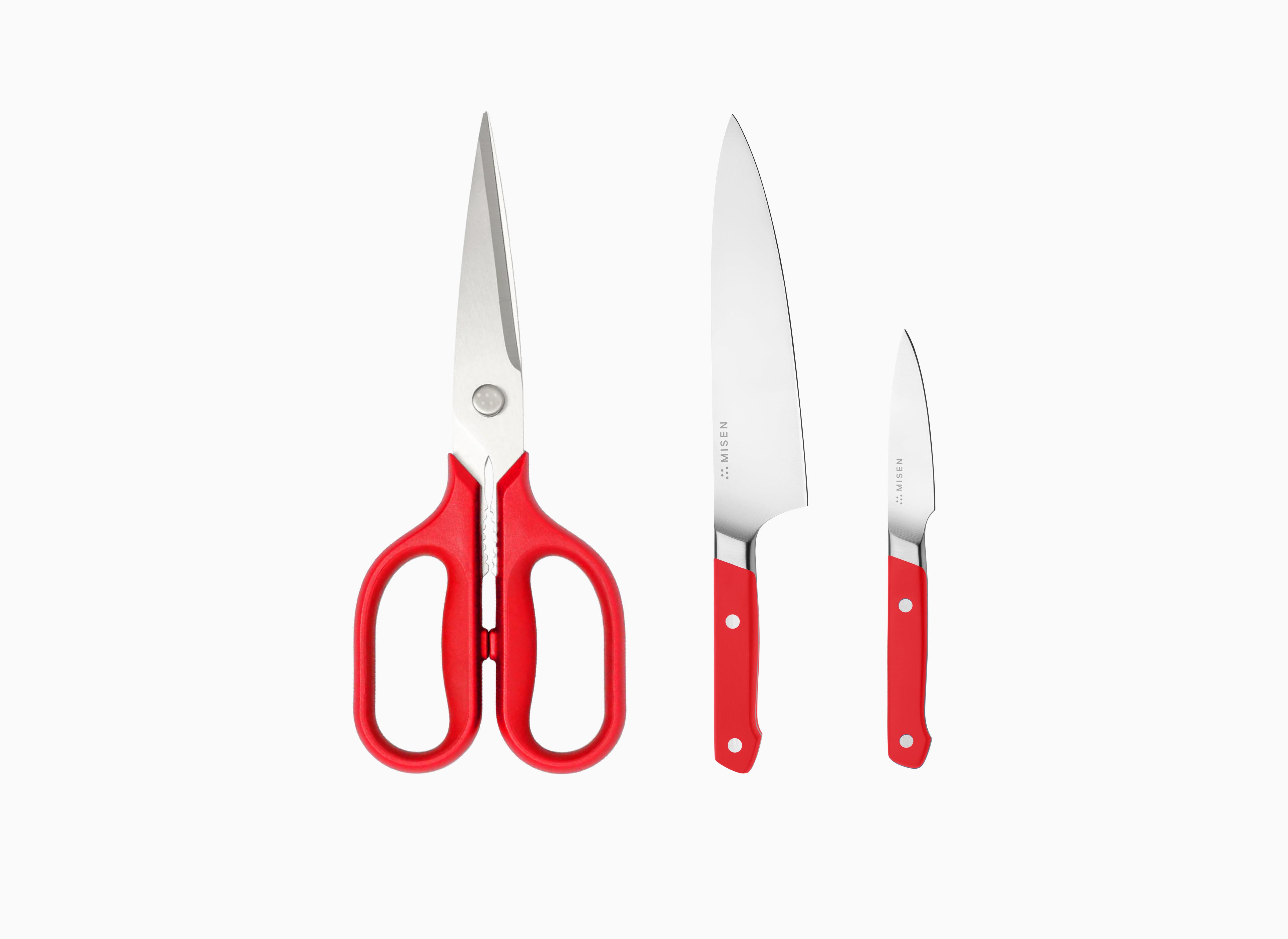 The Red Handed Set comes with a pair of standard Kitchen Shears, an 8 inch Chef's Knife and a 3.5 inch Paring Knife.