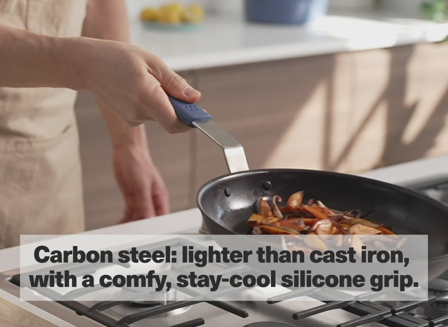 Carbon steel: lighter than cast iron, with a comfy, stay-cool silicone grip.