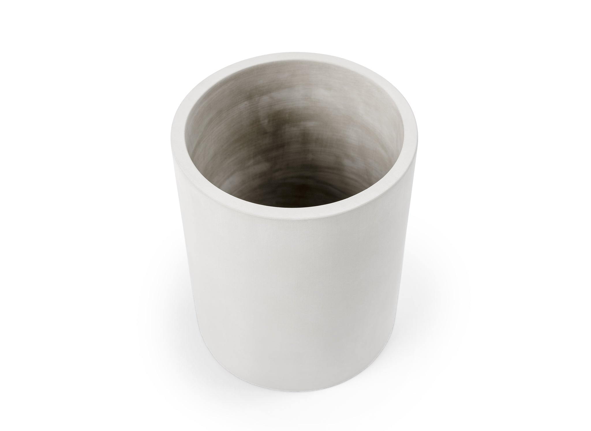 An empty White Misen Prep Tool Holder seen from a high angle on a white background. Part of the holder’s grey interior is visible.
